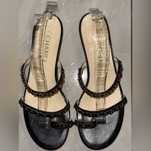 CHANEL Black Sandals with Gold Accents